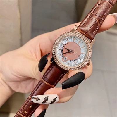 Round Diamonds With Date Stainless Steel Brown Leather Strap Watch For Women.