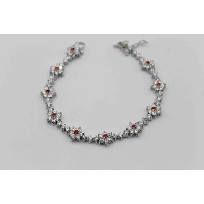 Beautiful bracelet with center flowered shaped orange zircon