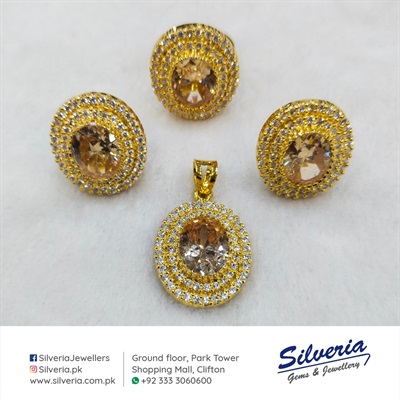 Gold plated pendant set in Champaign colored zircons