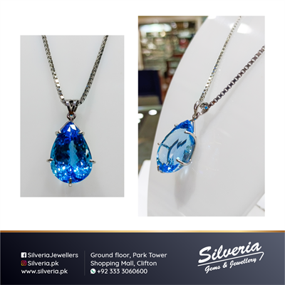 Tear drop shaped natural blue topaz in hand crafted 925 Sterling Silver pendant