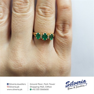 Ring with natural Emeralds and Diamonds in 21kt gold
