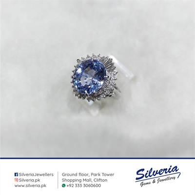 Natural Blue Sapphire and diamond ring in Platinum
