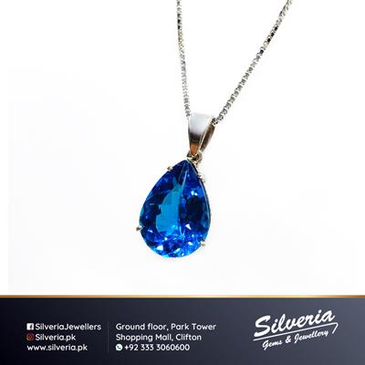 Tear drop shaped deep coloured Natural London Blue Topaz pendant in 925 Sterling Silver