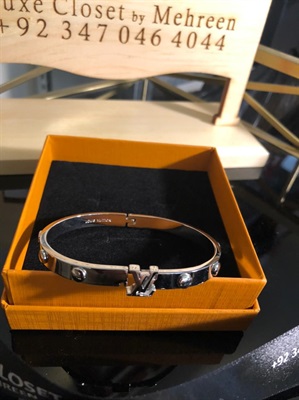 LV silver latch on bangle