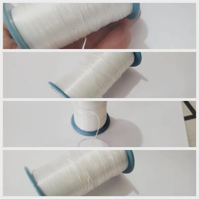 1 spool of elastic string in white color 30 gm /1mm