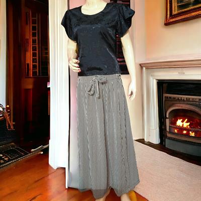 Elegant Black Top & Layered Line Skirt Set