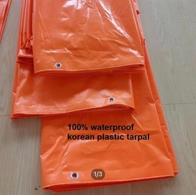 100% WATERPROOF Size (30 FEET X 30 FEET),KOREAN PLASTIC ORANGE TARPAL, USED FOR SUNSHADE AND OTHER OUTDOOR ACTIVITIES.