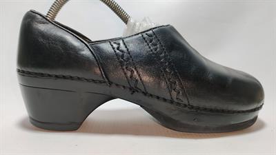 Dansko Woman's Black Leather Professional Heeled Clogs